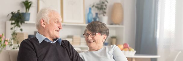 Portrait of a happy elderly couple spending time together, laughing and enjoying their retirement - Photo, Image