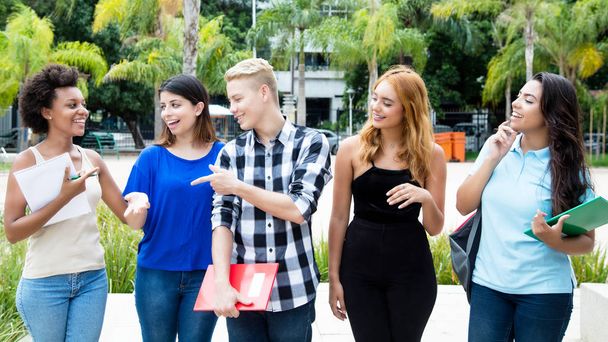 Group of international students walking outdoor on campus of university - Foto, Imagem