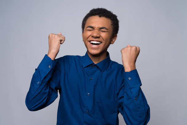 African American teenager in denim shirt - Fotoğraf, Görsel