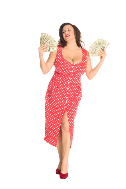 mooie plus grootte vrouw tevreden met veel geld op wit wordt geïsoleerd - Foto, afbeelding