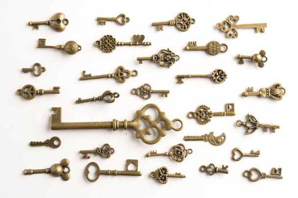 collection of old keys on a white background - Valokuva, kuva