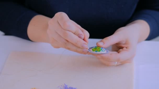 Designer making handmade brooch - Footage, Video