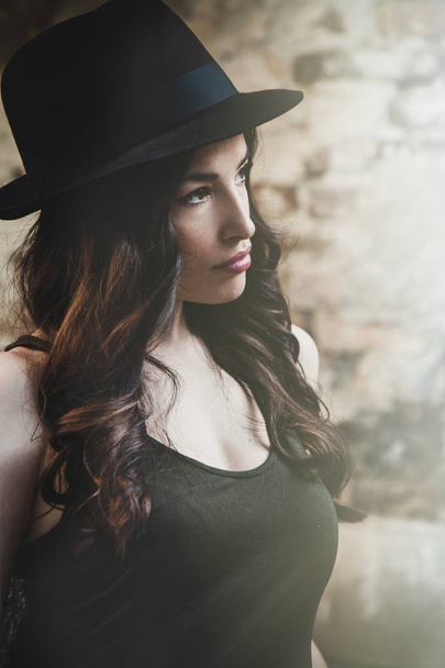 portrait of young beautiful woman with elegant man hat outdoor shot summer day in the city - Fotografie, Obrázek
