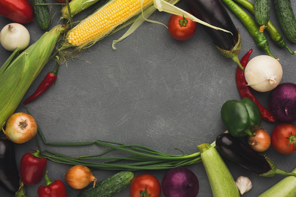 Frame of fresh vegetables on grey background with copy space - Photo, Image