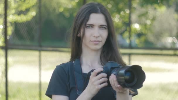 Portrait of Woman Photographer Taking Photos in Park. - Footage, Video