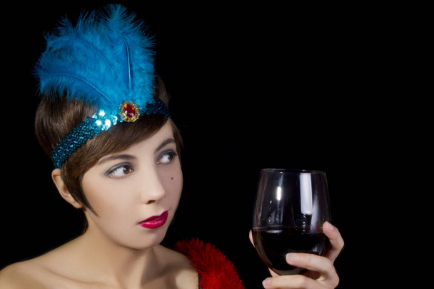 Girl in retro style with a glass of wine - Photo, Image