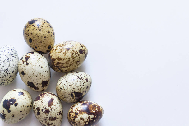 Quail eggs. Group of quail eggs isolated on white background. Closeup photo - Foto, Imagen