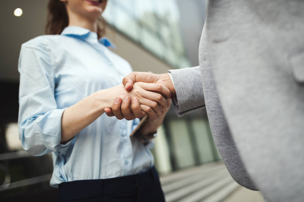 Successful young business people handshaking closing a deal - Fotoğraf, Görsel