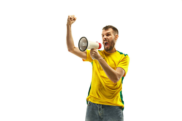 Brazilian fan celebrating on white background - Foto, Bild
