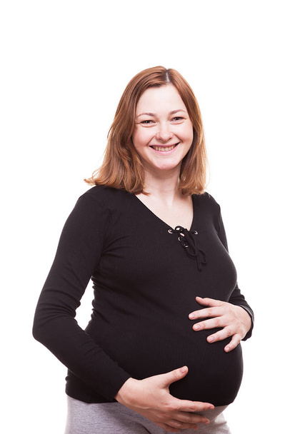 усміхнена вагітна жінка ізольована на білому тлі
 - Фото, зображення