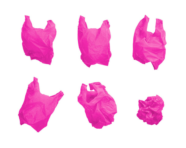 Collection of Pink color plastic bag in different composition, isolated on white background. - Foto, Imagen