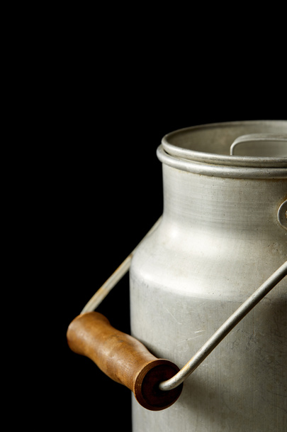 closeup view of milk in aluminium can isolated on black background  - 写真・画像