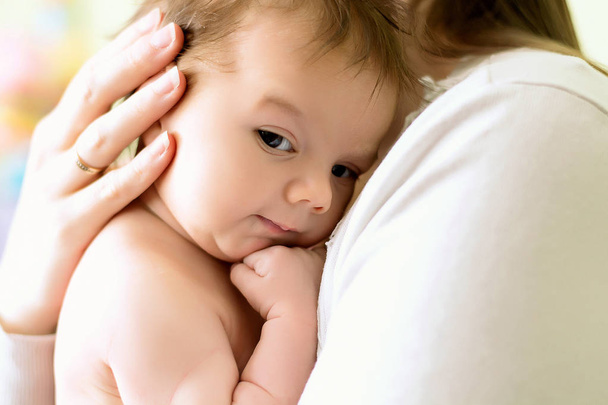 Newborn baby with mom in her arms - Fotografie, Obrázek
