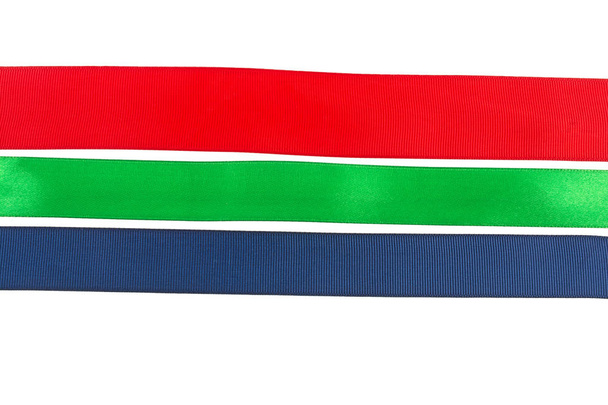 három szalagok, piros, zöld és kék-fehér alapon - Fotó, kép