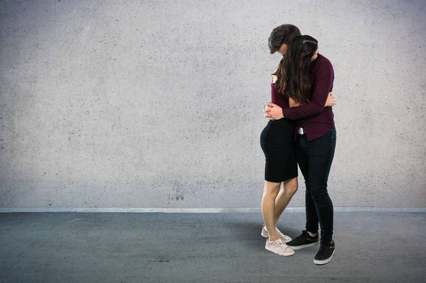 Young teenager couple hugging - Fotó, kép