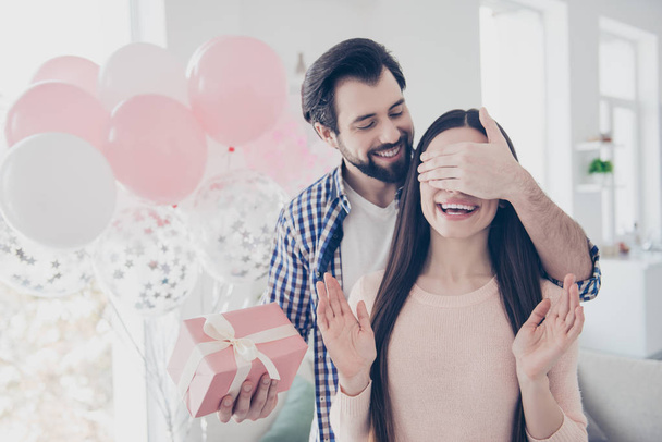 Portrait of bearded cheerful man closing eyes with palm to lover prepare pink packed gift box case, air ballons, sweet attractive cute couple celebrating valentine day, 14-february - Fotoğraf, Görsel