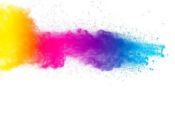 Multi color powder explosion on white background. Launched colorful dust particles splashing. Red yellow blue powder splatter. - Photo, Image