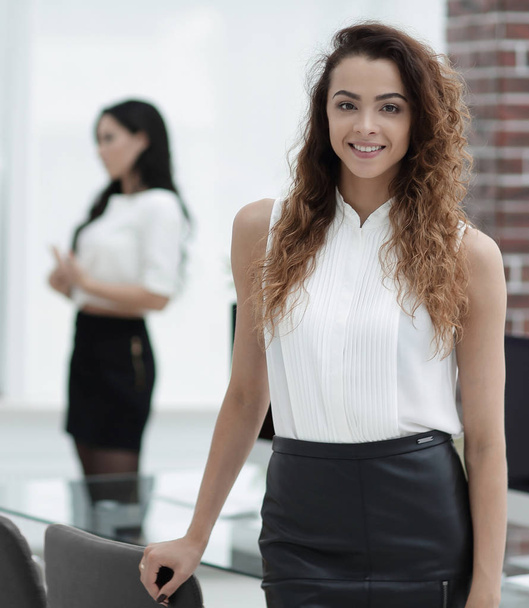 beautiful woman on the background of business people. - Photo, Image