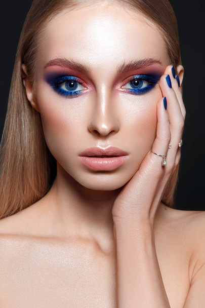 Beautiful woman portrait with blue glamour make up and blue nails - Фото, изображение