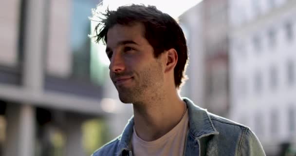 Portrait of young adult male looking to camera - Footage, Video