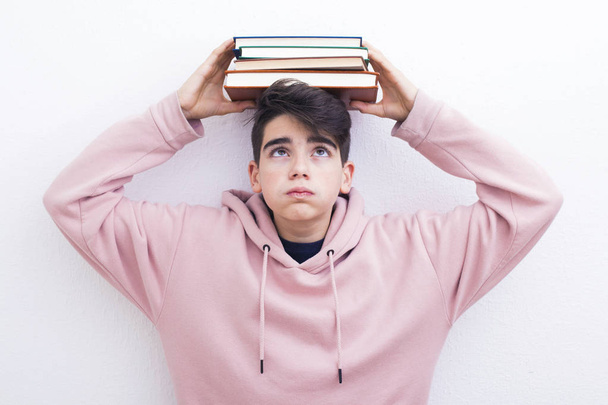 adolescent or preadolescent student with book on white background - Photo, Image