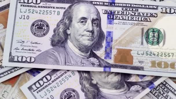 La disminución de la pérdida de dinero giratorio en dólares en efectivo
 - Imágenes, Vídeo