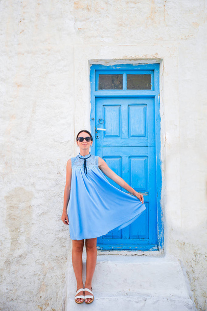 Young beautiful woman on vacation in Mykonos - Foto, Imagen