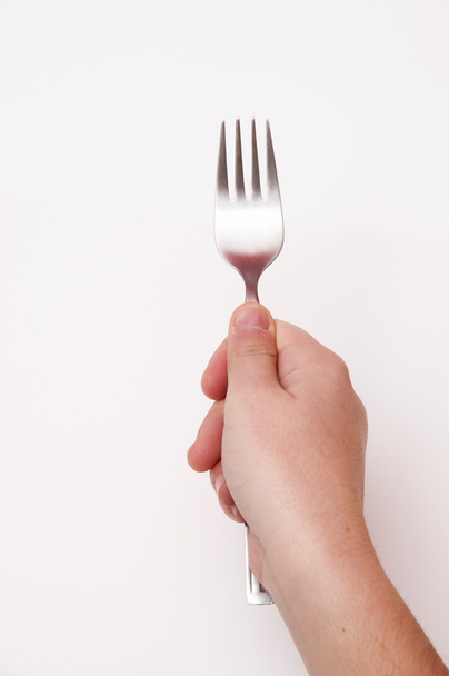 hand with fork - Photo, Image