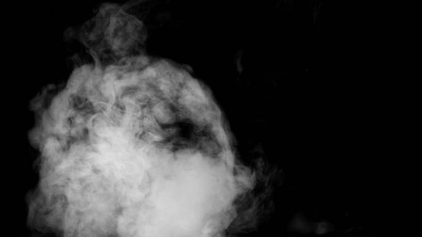 Сбор белого дыма на черном фоне
 - Фото, изображение