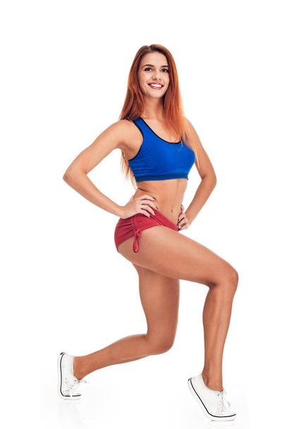 girl fitness. exercise with legs - Fotografie, Obrázek