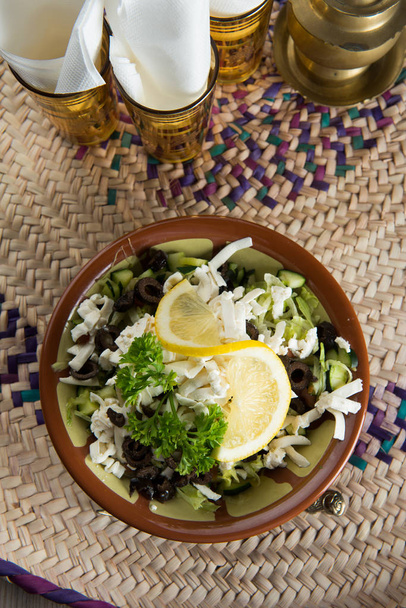 Delicious arabic salad served in ceramic bowl. - Φωτογραφία, εικόνα