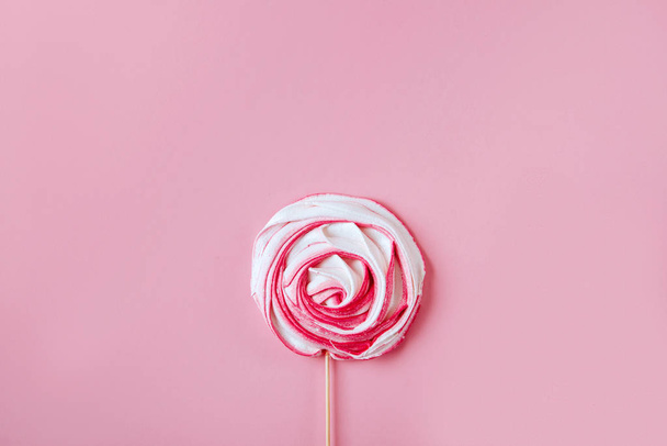 Pink candy on pink pastel background. lay flat style. - Photo, Image
