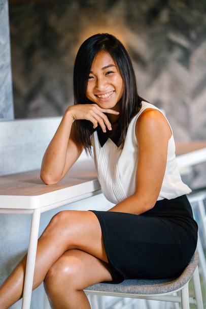 Portrait of a beautiful asian businesswoman in  casual clothes. Asian business woman in cafe - 写真・画像