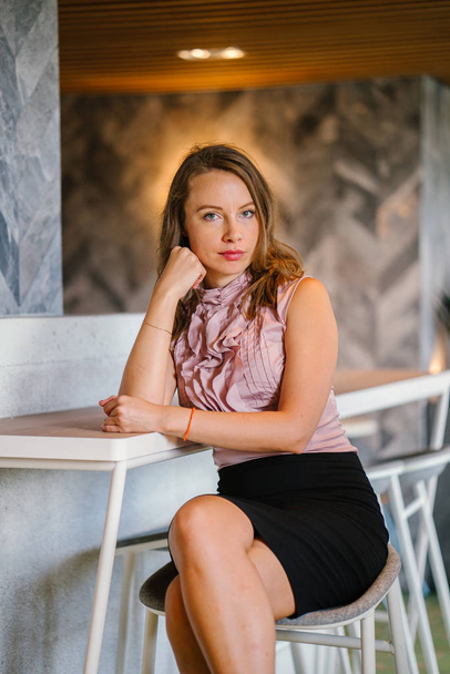 successful  young caucasian businesswoman  in cafe - Фото, зображення
