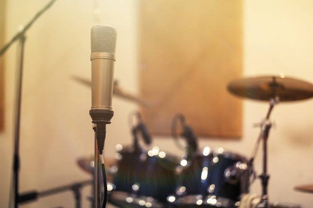 Music background. Studio microphone. Warm light toned - Photo, Image
