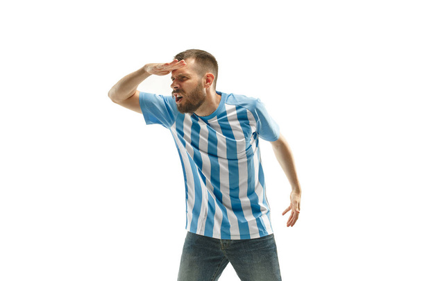 The unhappy and sad Argentinean fan on white background - Photo, Image