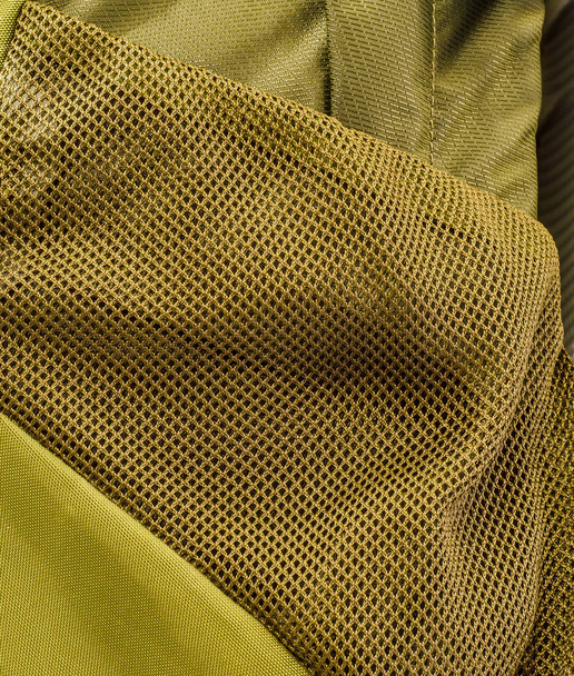 Tejido sintético fondo amarillo
 - Foto, imagen