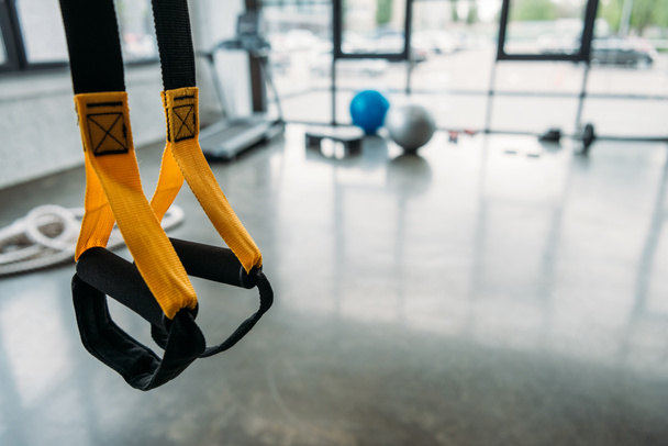 closeup view of suspension training trx at gym  - Photo, Image