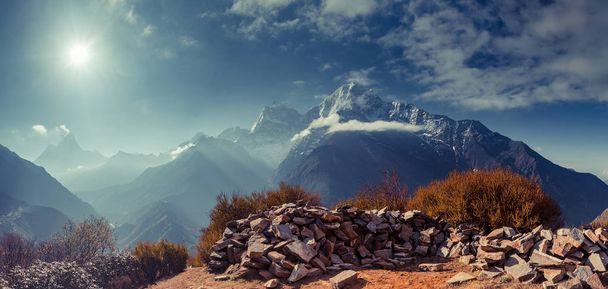 The boulders on the mountain background. Nepal. - 写真・画像