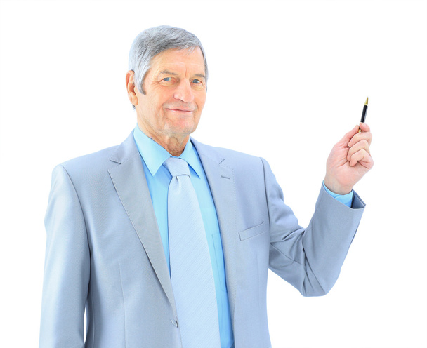 Businessman in age, writes in the air. Isolated on a white background. - Foto, Imagem