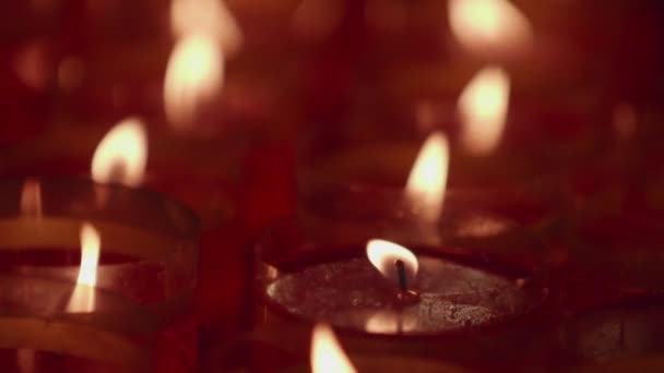 A closeup shot of flame on candle in slow motion - Materiał filmowy, wideo