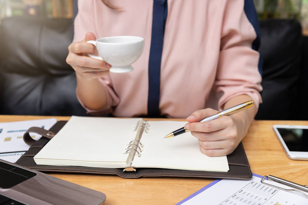 Business and finance concept, Businesswoman working in coffee shop - 写真・画像