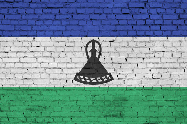 Lesotho zászló pingált egy régi tégla fal - Fotó, kép