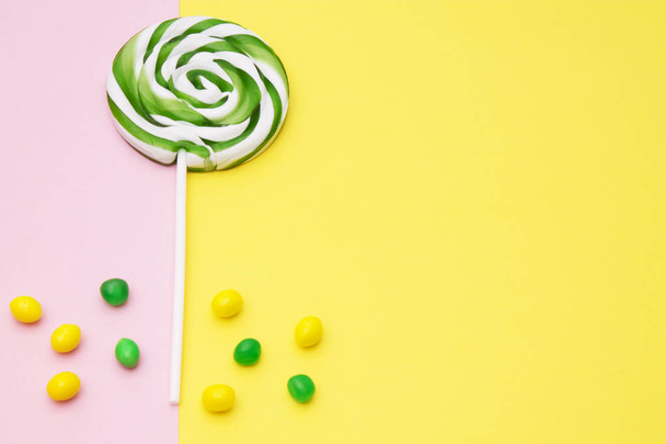 lollipops and colorful candies on backgrounds - Photo, image
