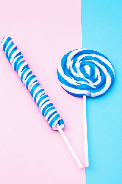 colorful spiral lollipops on colorful backgrounds - Φωτογραφία, εικόνα
