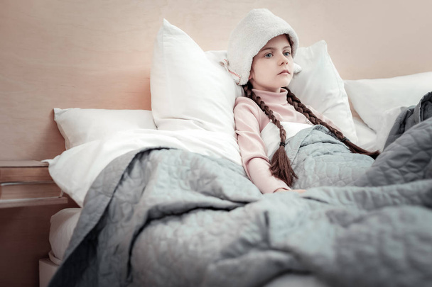 Frustrated girl lying in her bed - Foto, Imagem