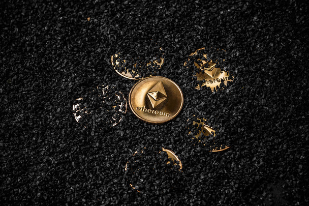 Gold ethereum coin on black background - Fotó, kép