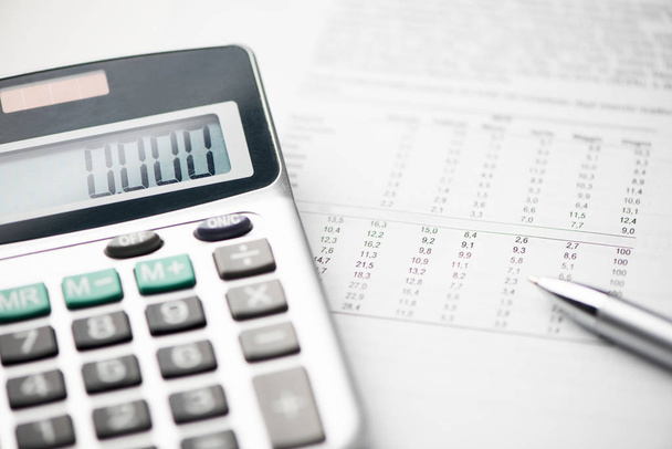 Financial accounting, Calculator and pen - Zdjęcie, obraz