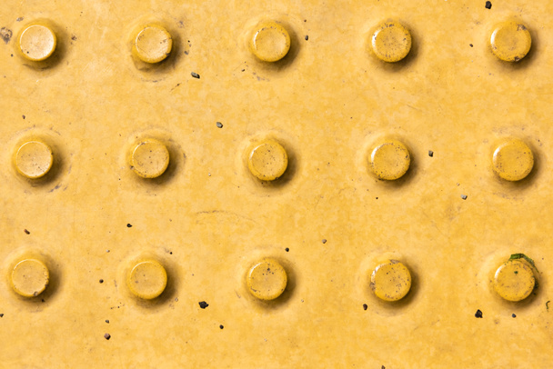 close-up view of yellow rough weathered metal background - Zdjęcie, obraz