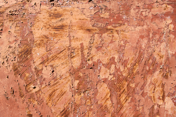 close-up view of brown scratched weathered rough wall texture   - 写真・画像